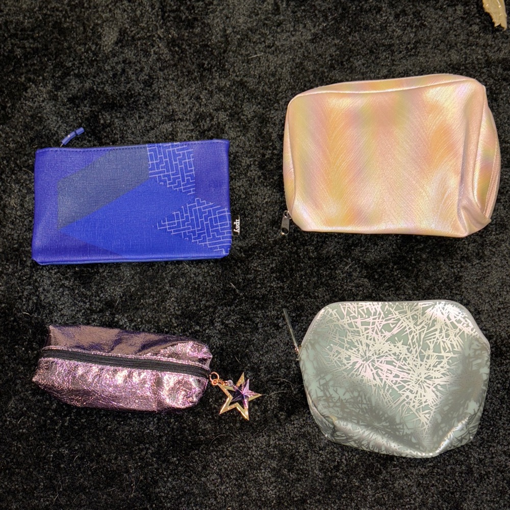 Set of Four Cosmetic Bags in Various Colors